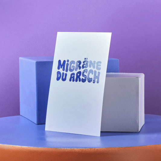 Postkarte Migräne du Arsch