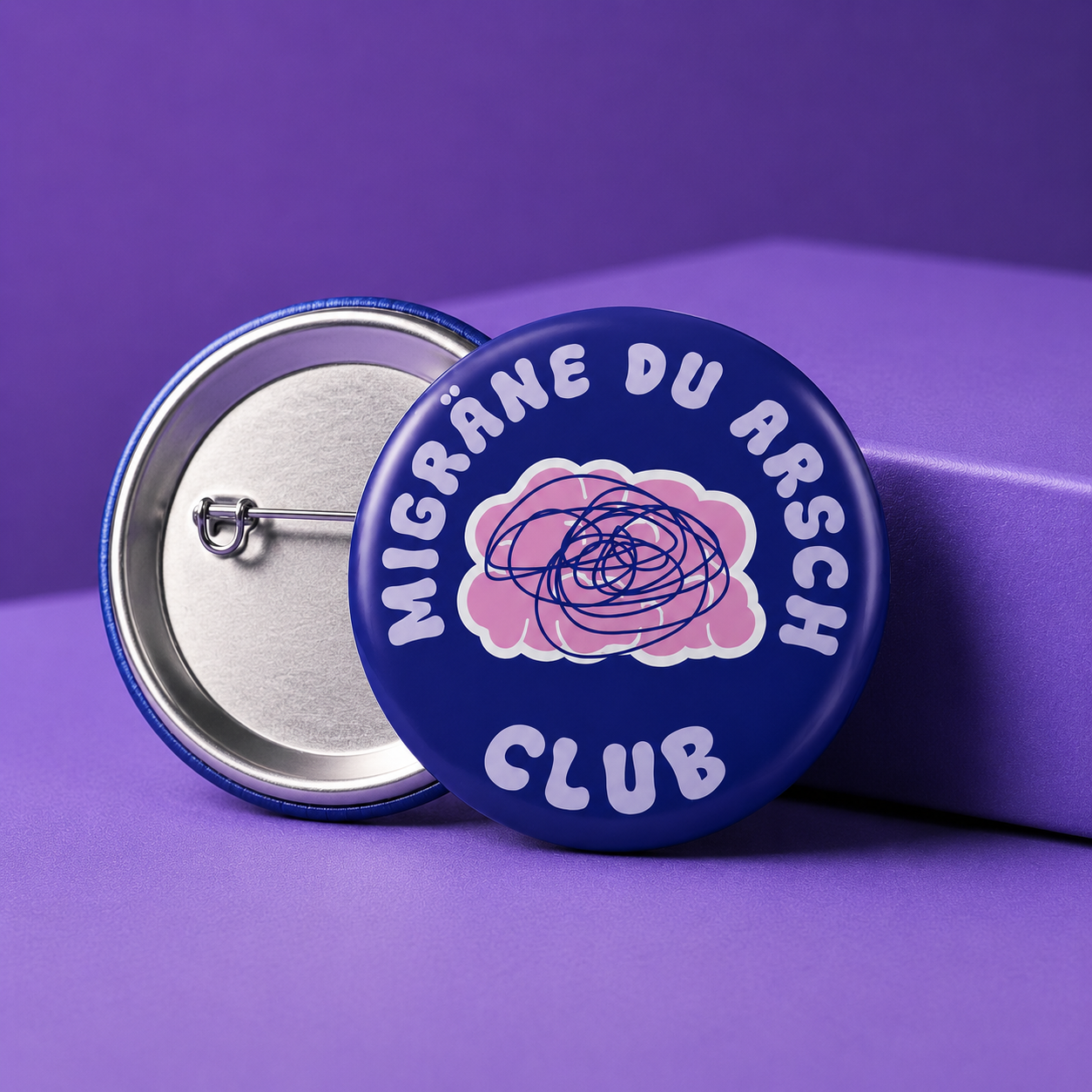 Button „Migräne du Arsch Club“