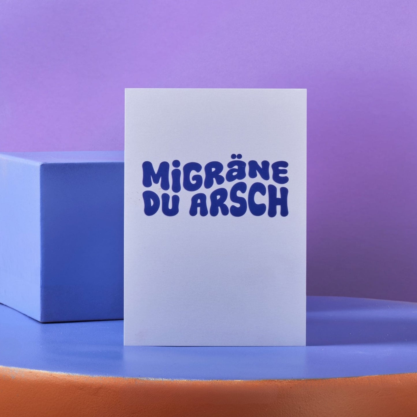 Postkarte Migräne du Arsch
